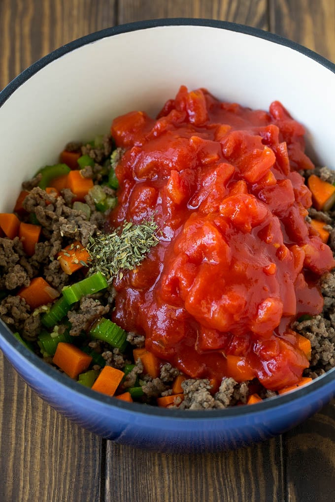 Alphabet Soup Recipe | Hamburger Soup | Beef and Vegetable Soup #soup #hamburger #noodles #dinner #jonep #carrots Ground beef, vegetables, canned tomatoes and seasonings in a pot.