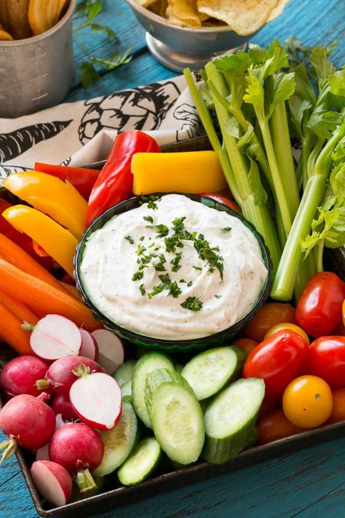 Homemade Ranch Dip Recipe | Homemade Ranch Powder | Homemade Ranch Dressing | Best Ranch Dip #ranch #dip #appetizer #snack #jonep A bowl of homemade ranch dip surrounded by fresh vegetables.