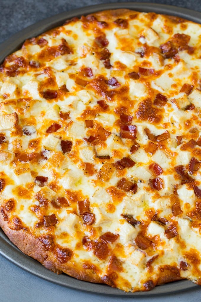 Chicken Alfredo Pizza Recipe #pizza #chicken #bacon #dinner #jonep A baked crust topped with melted cheese and meat.