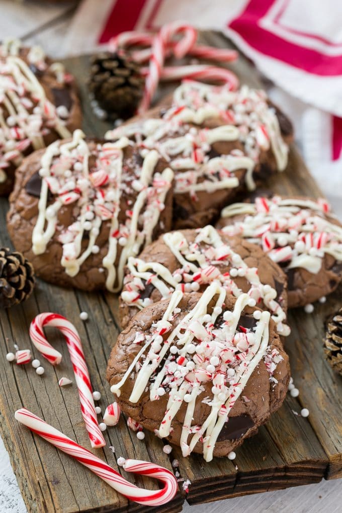 Peppermint Bark Cookie | Easy Peppermint Bark Cookies | Christmas Cookies | Peppermint Bark Cookies | Chocolate Peppermint Cookie #peppermint #peppermintbark #cookies #christmas #holiday #dessert #jonep Peppermint Bark Cookies drizzled with white chocolate.