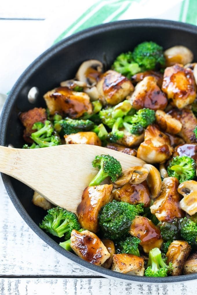 Chicken and Broccoli Stir Fry Recipe | Chicken Stir Fry | Healthy Chicken Recipe | Chicken and Broccoli | Chinese Food #chicken #broccoli #stirfry #healthy #cleaneating #dinner #jonep A stir fry of chicken, broccoli and mushrooms in a skillet with a spatula.