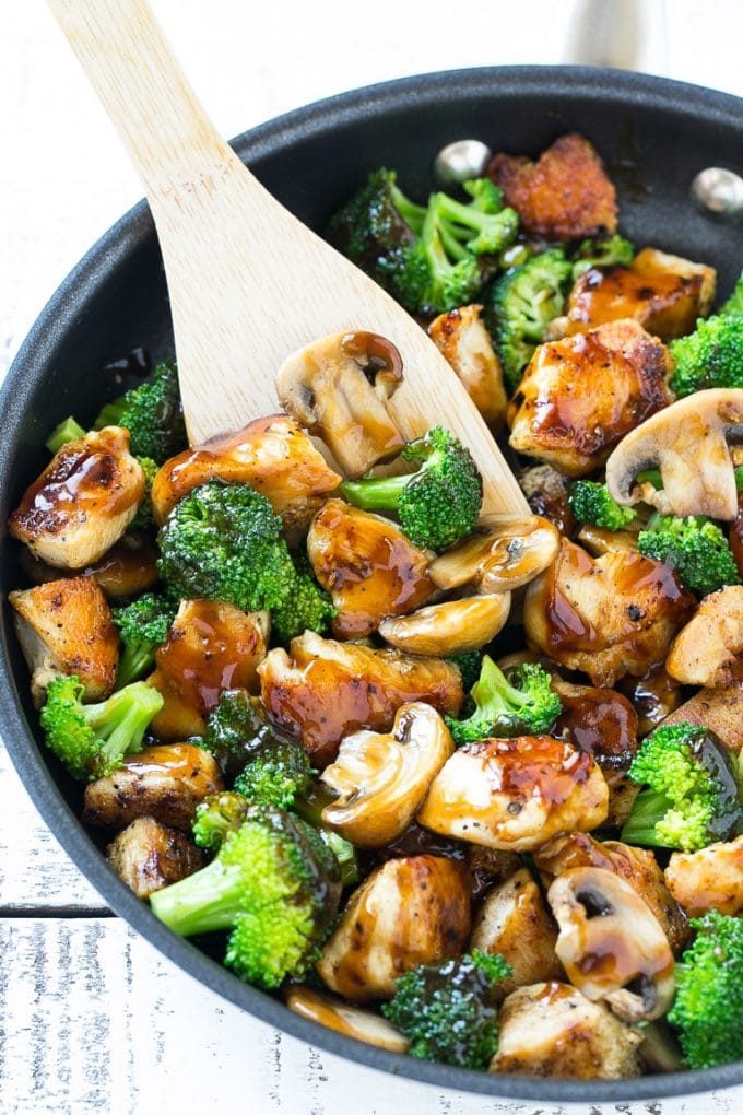 Chicken and Broccoli Stir Fry Recipe | Chicken Stir Fry | Healthy Chicken Recipe | Chicken and Broccoli | Chinese Food #chicken #broccoli #stirfry #healthy #cleaneating #dinner #jonep Chicken and broccoli stir fry with mushrooms in a skillet with a spatula.