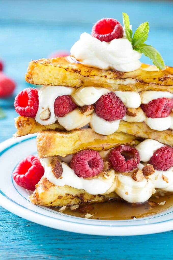 Stuffed French Toast | Cream Cheese Stuffed French Toast | French Toast Recipe #frenchtoast #raspberry #creamcheese #breakfast #brunch #jonep Stuffed french toast filled with cream cheese and raspberries.