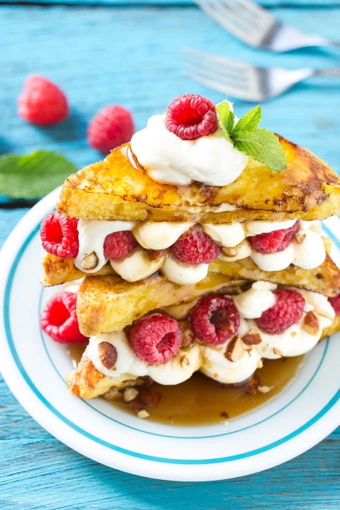 Stuffed French Toast | Cream Cheese Stuffed French Toast | French Toast Recipe #frenchtoast #raspberry #creamcheese #breakfast #brunch #jonep Stuffed french toast with a cream cheese, berry and almond filling.