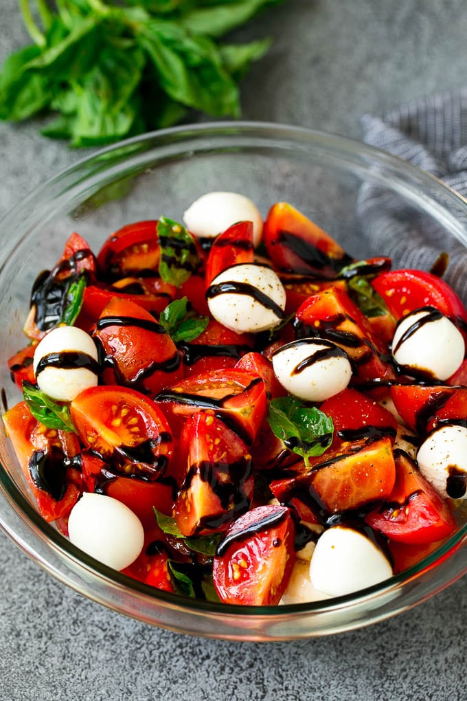 Caprese Salad Recipe | Tomato Salad #salad #tomato #mozzarella #cheese #basil #caprese #summer #jonep Caprese salad with tomatoes, fresh mozzarella, basil leaves and balsamic glaze.