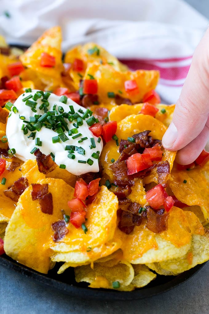 Irish Nachos Recipe | Potato Nachos | Potato Chip Recipe | Appetizer Recipe #nachos #potatoes #cheese #bacon #appetizer #jonep Irish nachos loaded with cheese, bacon, sour cream, tomatoes and chives.
