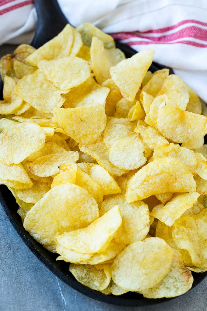 Irish Nachos Recipe | Potato Nachos | Potato Chip Recipe | Appetizer Recipe #nachos #potatoes #cheese #bacon #appetizer #jonep Kettle chips in a skillet.