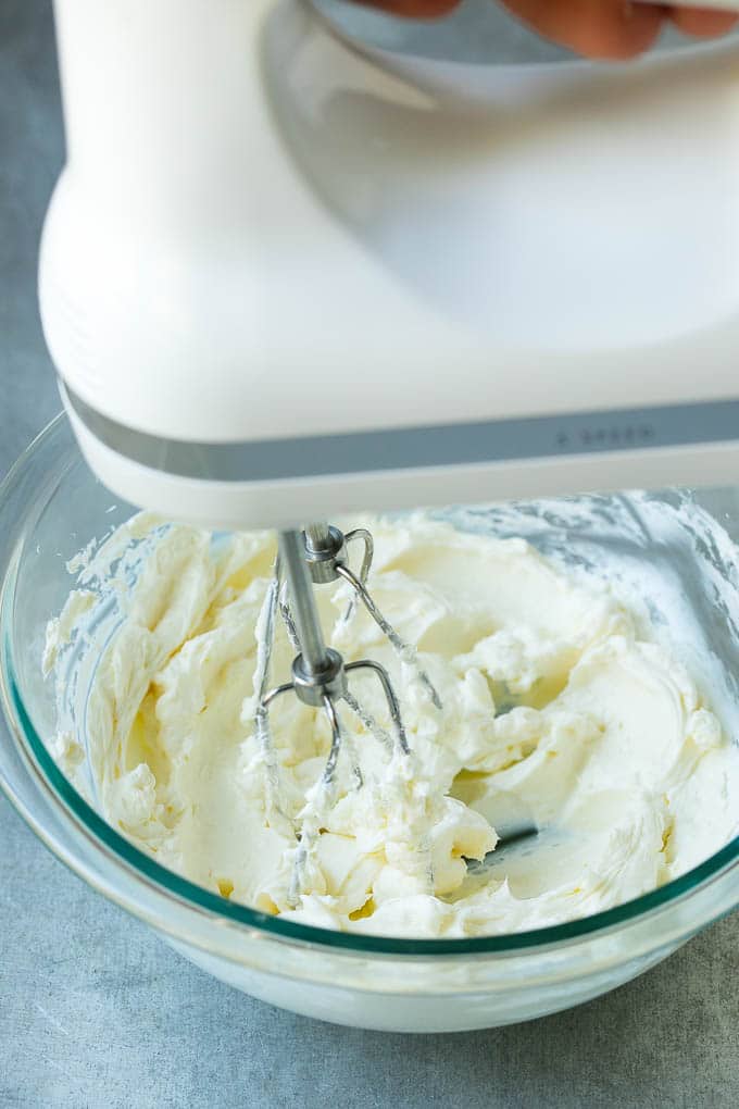 Cream Cheese Fruit Dip | Fruit Recipe | Fruit Dip #fruit #dip #creamcheese #snack #dessert #jonep A mixer whipping up cream cheese for fruit dip.