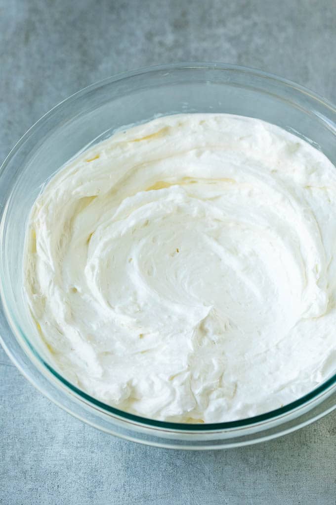 Cream Cheese Fruit Dip | Fruit Recipe | Fruit Dip #fruit #dip #creamcheese #snack #dessert #jonep Cream cheese, marshmallow cream and whipped topping in a mixing bowl.