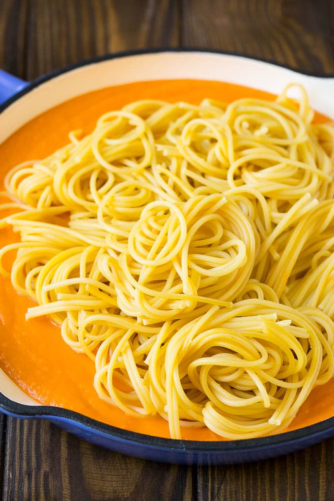 Butternut Squash Pasta Recipe #pasta #squash #bacon #fall #dinner #jonep Spaghetti in a pool of butternut squash sauce.