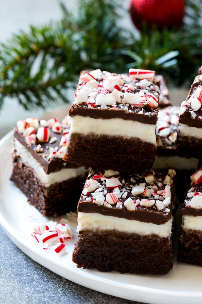 Peppermint Brownies Recipe | Holiday Brownies | Candy Cane Brownies | Mint Brownies #brownies #mint #peppermint #chocolate #dessert #christmas #jonep These easy peppermint brownies on a plate are the perfect holiday treat.