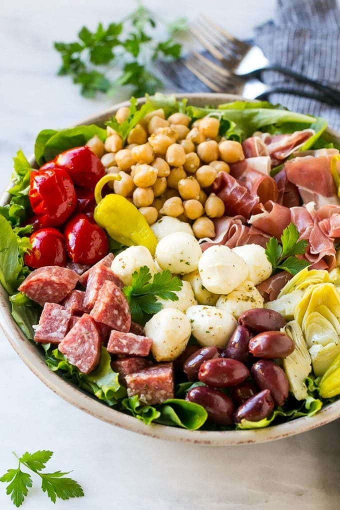 Antipasto Salad Recipe | Italian Salad | Main Course Salad | Antipasto Recipe #salad #salami #italianfood #dinner #lunch #jonep Antipasto salad with cured meats, fresh mozzarella cheese and roasted peppers over salad greens.