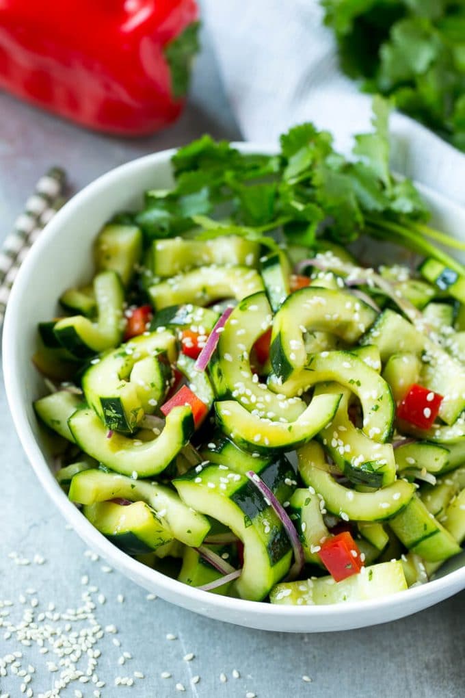Asian Cucumber Salad Recipe | Sesame Cucumber Salad | Cucumber Salad | Healthy Salad | Healthy Cucumber Recipe #cucumber #cucumbersalad #salad #sidedish #jonep This recipe for Asian cucumber salad is cucumbers and colorful veggies tossed in a zesty sesame dressing. The perfect quick and easy side dish!