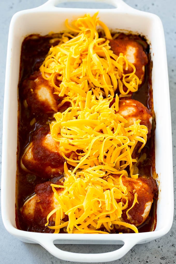 Salsa Chicken Recipe | Baked Chicken | Mexican Chicken #chicken #salsa #mexican #lowcarb #keto #glutenfree #dinner #jonep White meat poultry topped with shredded cheddar cheese.