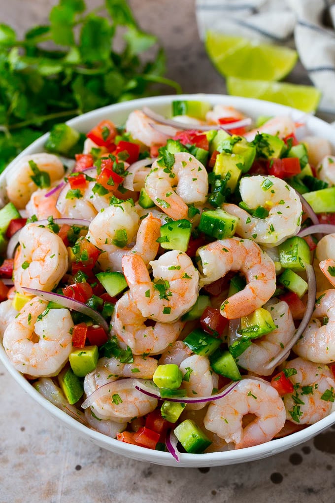 Shrimp Ceviche Recipe | Mexican Shrimp | Marinated Shrimp #shrimp #ceviche #cleaneating #healthy #lowcarb #keto #glutenfree #dinner #appetizer #jonep A bowl of shrimp ceviche marinated in citrus juice with tomato, avocado, cilantro and jalapeno.