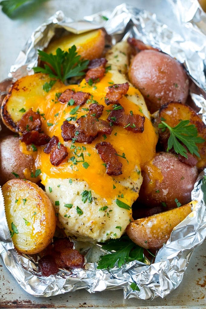Bacon Ranch Chicken Foil Packets | Chicken in Foil | Foil Packet Recipe | Ranch Chicken #ranchchicken #grilling #chicken #foilpacket #foilpackets #bacon #dinner #jonep A bacon ranch chicken foil packet with potatoes.