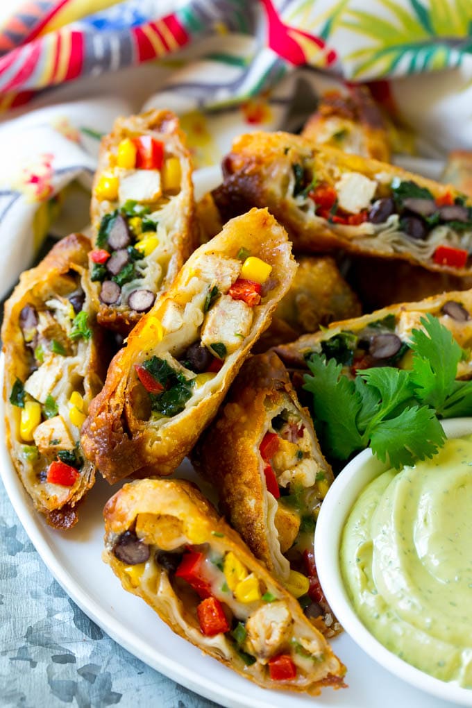 Southwestern Egg Rolls Recipe | Easy Egg Roll Recipe | Mexican Appetizer | Egg Roll Recipe | Southwest Egg Rolls #eggrolls #appetizer #chicken #snack #jonep Southwestern egg rolls filled with chicken, beans, peppers, corn and cheese.