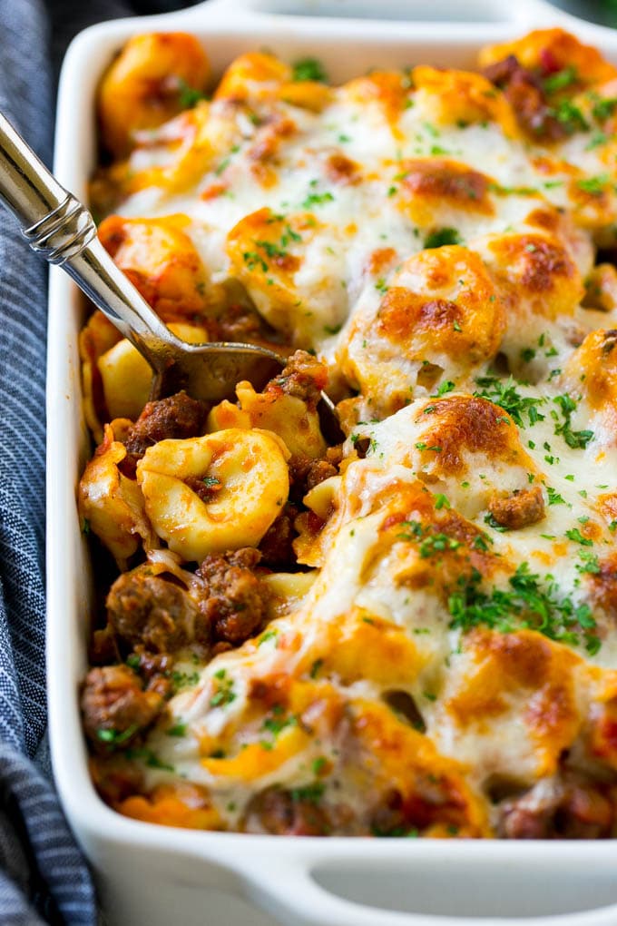 Baked Tortellini with Meat Sauce Recipe | Cheese Tortellini | Tortellini Recipe | Baked Pasta Recipe #tortellini #bakedtortellini #meatsauce #pasta #dinner #jonep A pan of baked tortellini in a meat sauce, all covered with cheese.