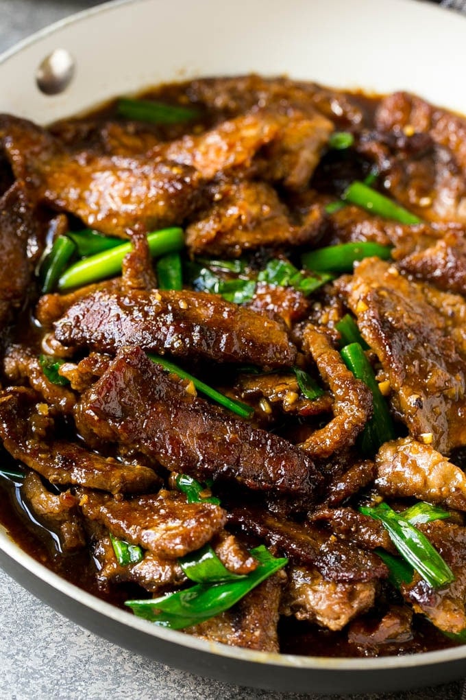 Mongolian Beef Recipe | Asian Beef Recipe | Chinese Beef | Beef Stir Fry #Chinese #Mongolian #Asian #mongolianbeef #beef #jonep #dinner A pan full of Mongolian beef with green onions.