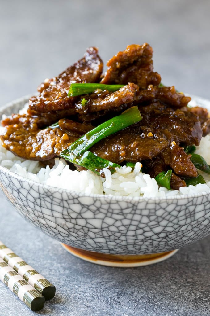 Mongolian Beef Recipe | Asian Beef Recipe | Chinese Beef | Beef Stir Fry #Chinese #Mongolian #Asian #mongolianbeef #beef #jonep #dinner A bowl of mongolian beef over rice.