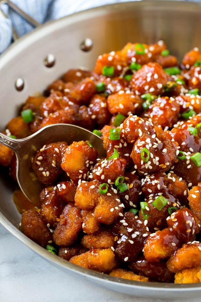 Sesame Shrimp Recipe | Crispy Shrimp | Popcorn Shrimp | Asian Shrimp | Easy Shrimp Recipe #shrimp #fried #friedshrimp #sesameshrimp #crispy #popcornshrimp #chinese #asian #dinner #jonep A pan of crispy sesame shrimp tossed in an Asian style sauce.