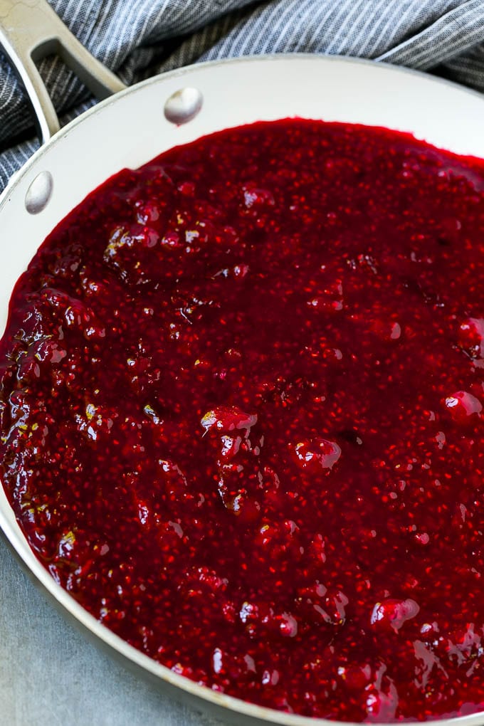 Raspberry Sauce Recipe | Homemade Raspberry Sauce | Raspberry Recipe #raspberries #dessert #jonep Berries cooked in a skillet.
