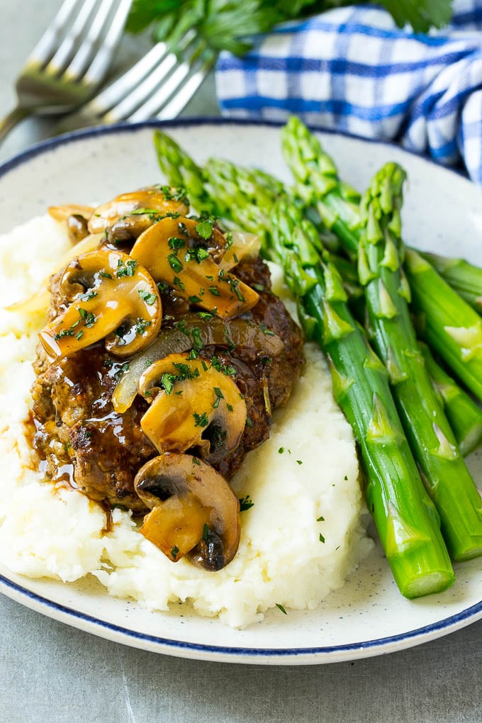 Slow Cooker Salisbury Steak Recipe | Homemade Salisbury Steak | Salisbury Steak from Scratch #steak #beef #salisbury #salisburysteak #slowcooker #crockpot #dinner #jonep Slow cooker salisbury steak with mushroom gravy over mashed potatoes.