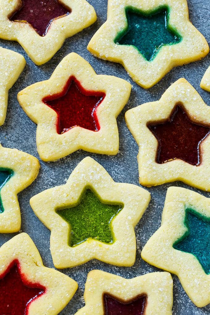 Stained Glass Cookies | Stained Glass Window Cookies | Christmas Cookies | Sugar Cookies | Holiday Cookies #cookies #stainedglasscookies #sugarcookies #christmascookies #christmas #holiday #dessert #jonep Stained glass window cookies in various colors.