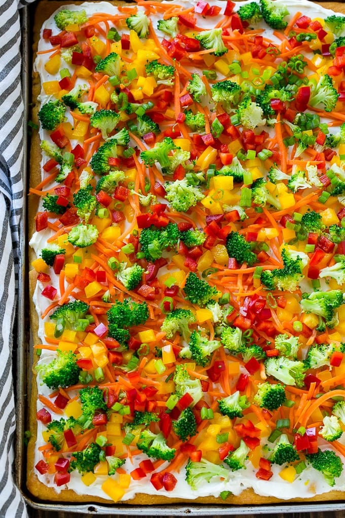 Veggie Pizza Recipe | Crescent Veggie Pizza | Vegetable Pizza Recipe | Holiday Appetizer | Homemade Veggie Pizza #pizza #veggies #vegetarian #appetizer #jonep A sheet pan of crescent veggie pizza.