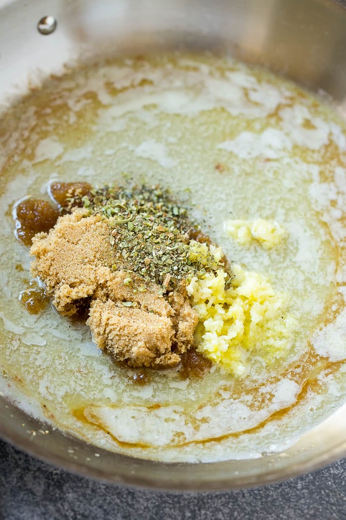 Brown Sugar Pork Chops Recipe | Bone In Pork Chops Recipe | Garlic Butter Pork Chops | Skillet Pork Chops #pork #porkchops #garlic #dinner #glutenfree #jonep Melted butter, brown sugar, herbs and garlic form the sauce for pork chops.