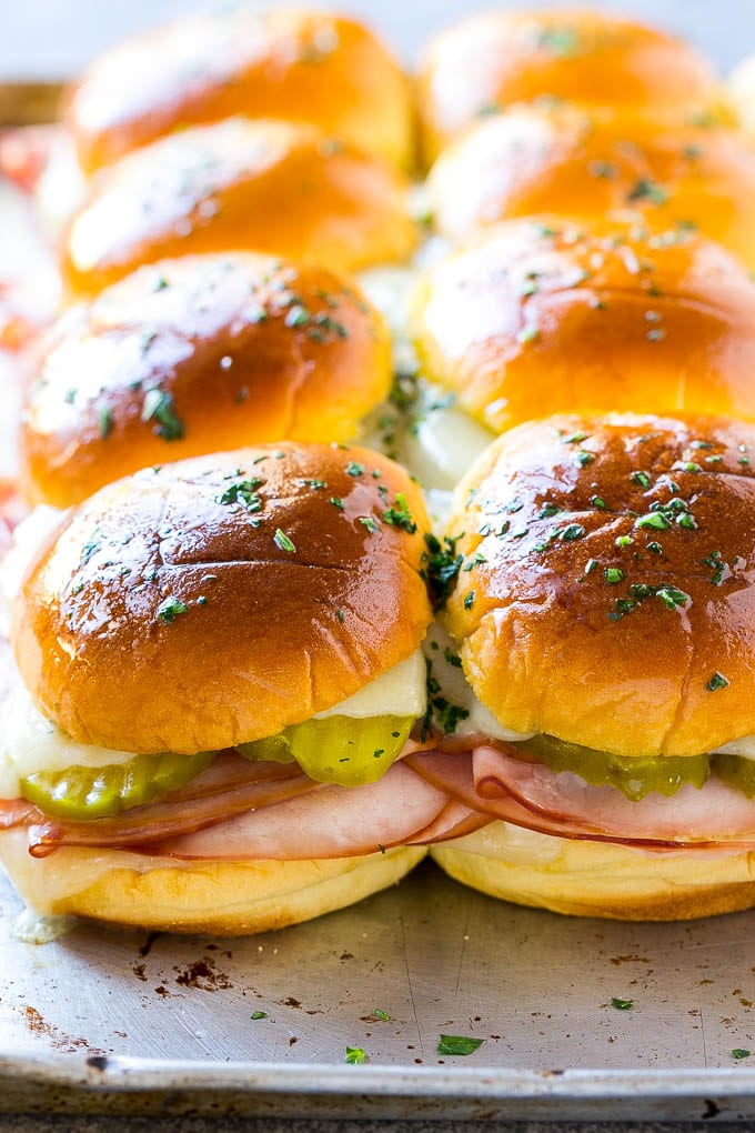 Cuban Sliders Recipe | Cuban Sandwich Recipe | Slider Sandwiches | Ham and Cheese Sliders #sliders #sandwiches #ham #cheese #appetizer #jonep A sheet pan of Cuban slider sandwiches.