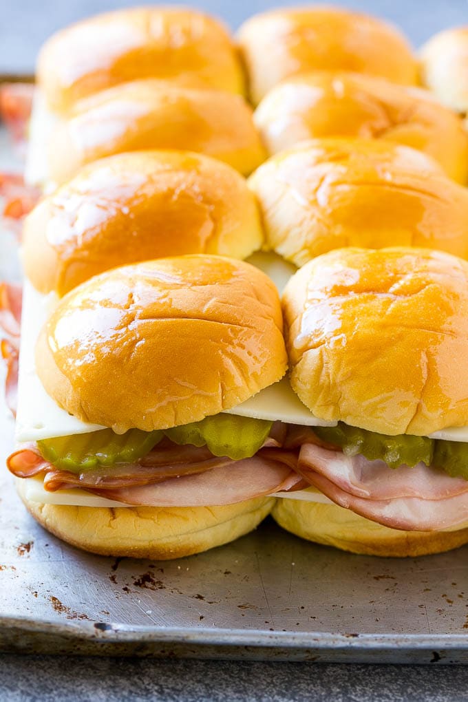 Cuban Sliders Recipe | Cuban Sandwich Recipe | Slider Sandwiches | Ham and Cheese Sliders #sliders #sandwiches #ham #cheese #appetizer #jonep Assembled slider sandwiches ready to go into the oven.