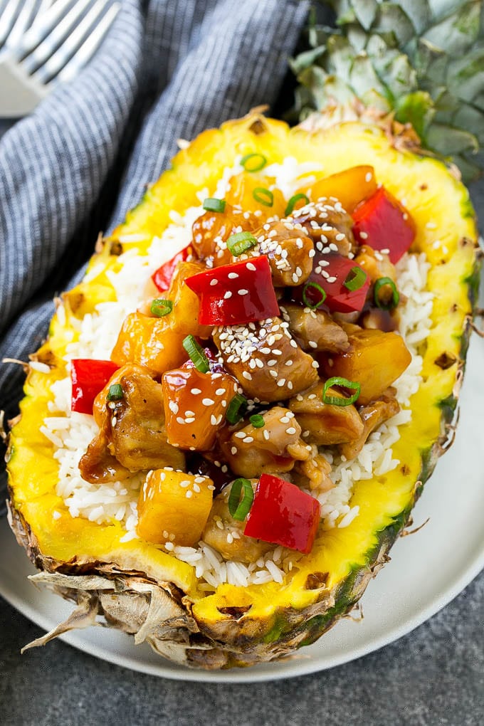 Pineapple Chicken | Hawaiian Chicken | Chicken Stir Fry #pineapple #chicken #dinner #stirfry #jonep Pineapple chicken stir fry over rice served inside half a pineapple.