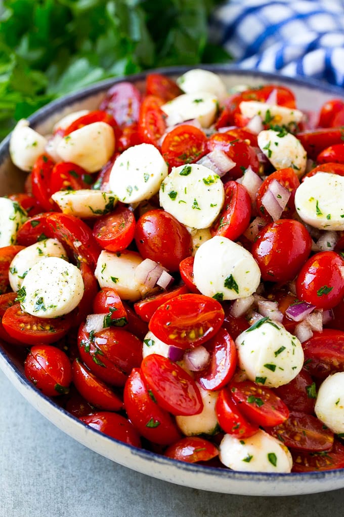 Cherry Tomato Salad Recipe | Tomato Mozzarella Salad | Caprese Salad | Tomato Salad #tomatoes #salad #tomatosalad #caprese #jonep Cherry tomato salad with halved cherry tomatoes, mozzarella balls and red onion, all tossed with herbs and dressing.