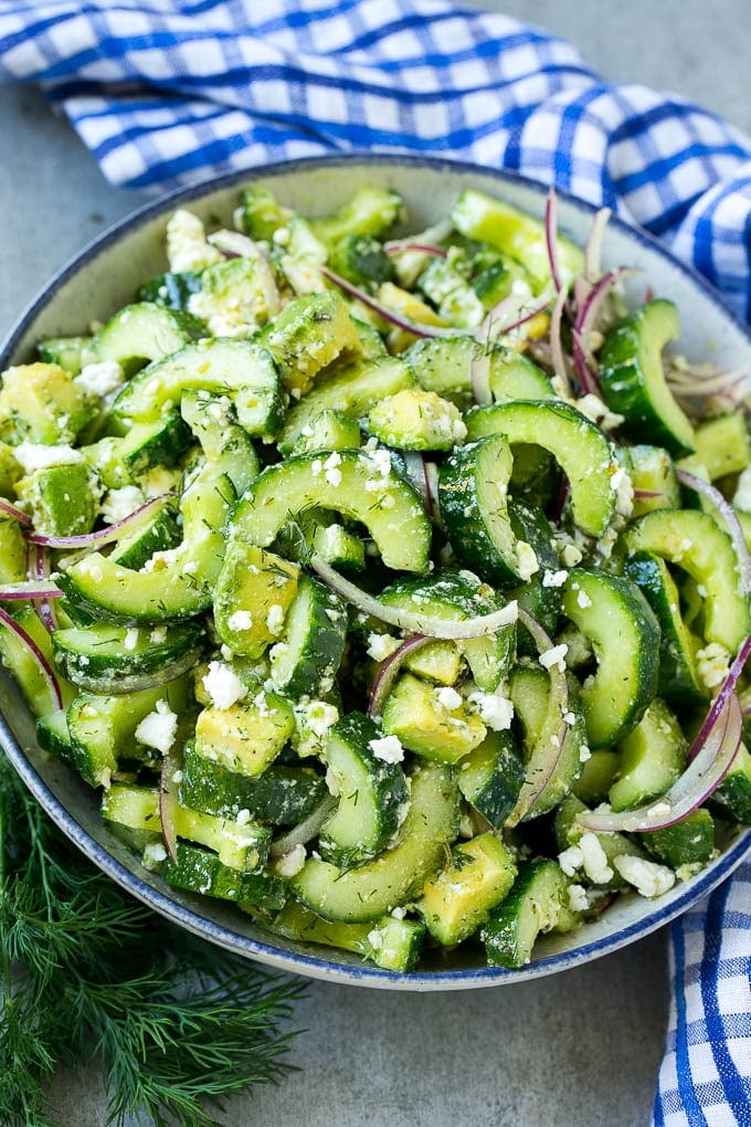 Cucumber Feta Salad Recipe | Cucumber Salad | Feta Cheese Salad | Summer Salad #salad #cucumber #jonep A bowl of cucumber feta salad with avocado.