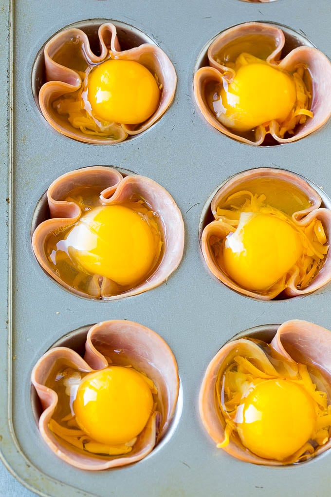 Ham and Egg Cups Recipe | Low Carb Breakfast | Ham and Eggs #ham #eggs #lowcarb #breakfast #jonep Ham pressed into muffin tins and topped with eggs and cheese.