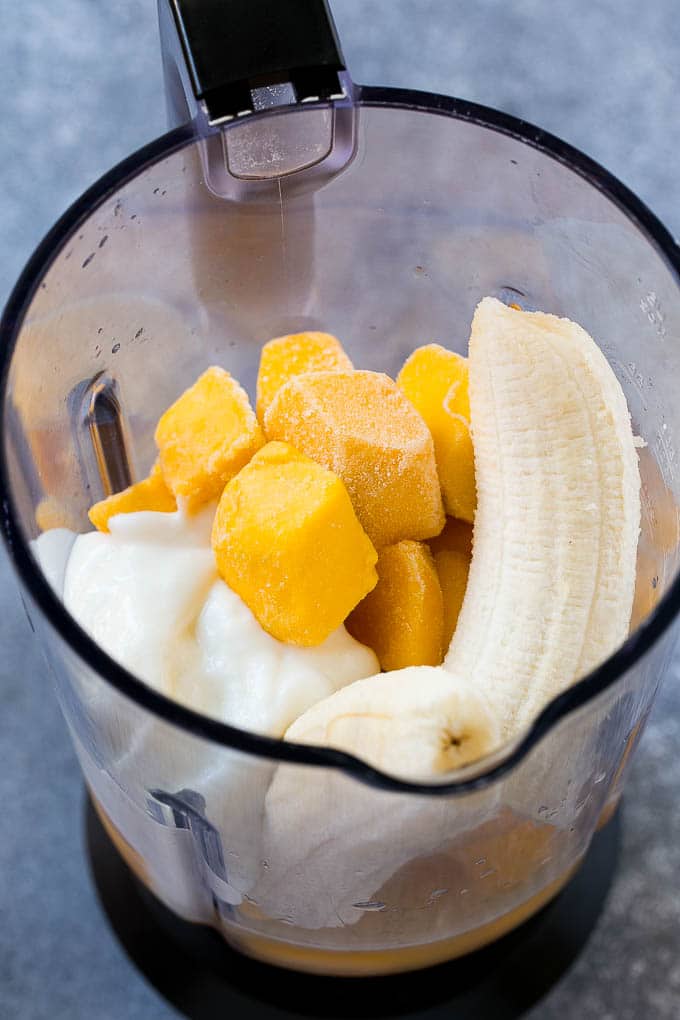 Mango Smoothie Recipe | Mango Recipe | Healthy Smoothie #mango #smoothie #drink #jonep Fruit, yogurt and juice in a blender.