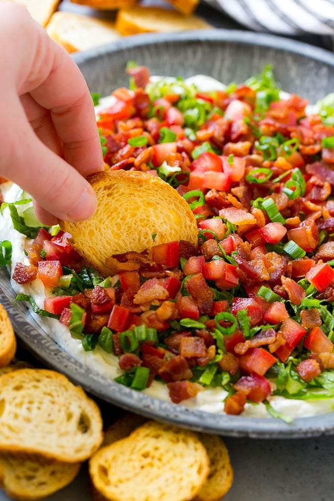 BLT Dip Recipe | Bacon Dip Recipe | Ranch Dip #dip #ranch #bacon #lettuce #tomato #appetizer #jonep BLT dip with bacon, lettuce, tomato and green onions over a creamy ranch dip.
