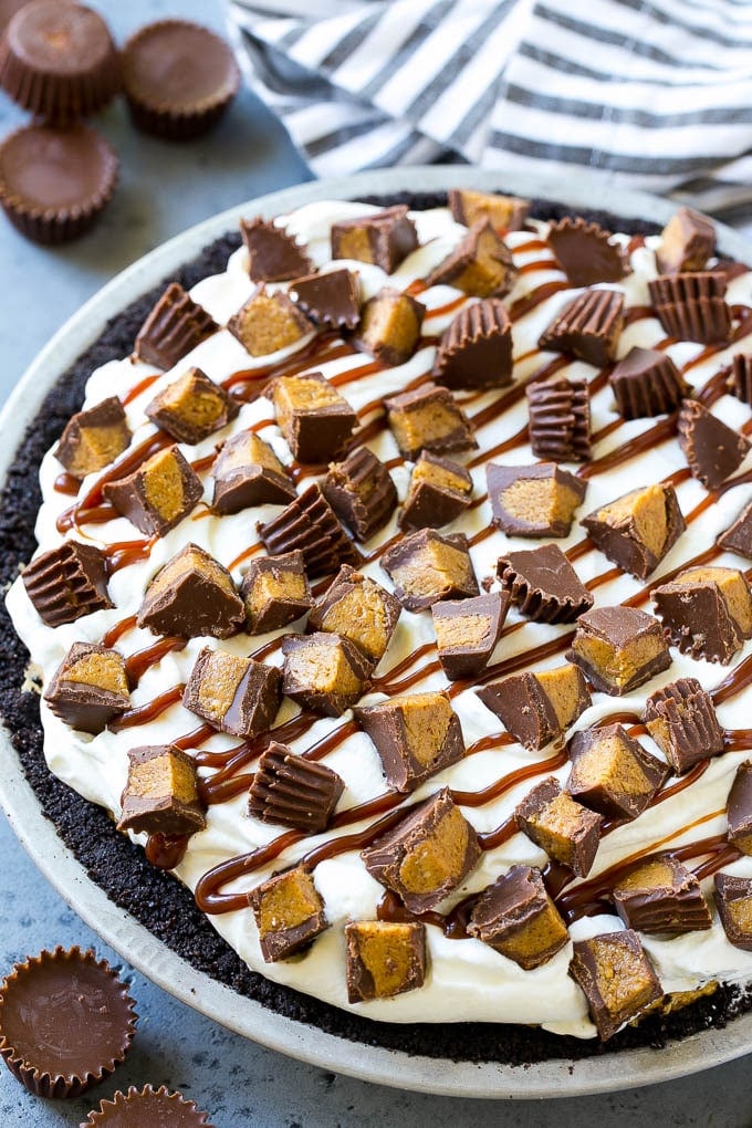 Chocolate Peanut Butter Pie Recipe | Peanut Butter Cup Pie | Peanut Butter Pie | No Bake Pie #chocolate #peanutbutter #pie #nobake #dessert #jonep A peanut butter pie with cookie crust, peanut butter filling, whipped cream topping and chopped peanut butter cups.