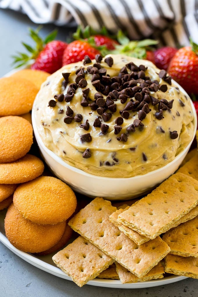 Cookie Dough Dip Recipe | Edible Cookie Dough | Chocolate Chip Cookie Dip #cookies #dip #cookiedough #dessert #snack #jonep Chocolate chip cookie dough dip, topped with mini chocolate chips and served with graham crackers and vanilla wafers.