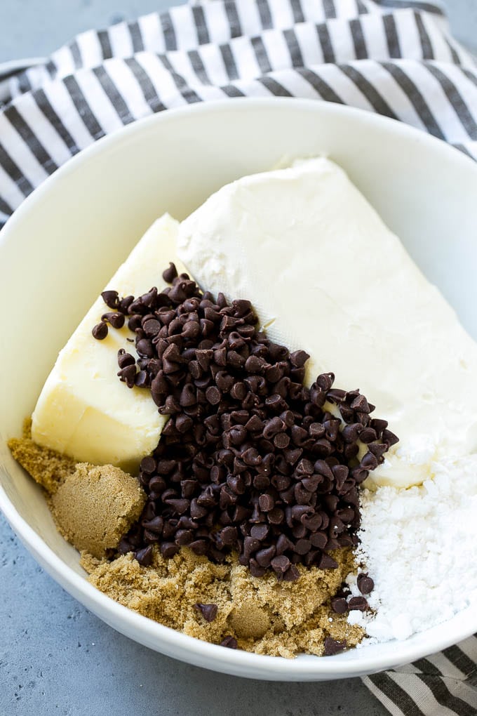 Cookie Dough Dip Recipe | Edible Cookie Dough | Chocolate Chip Cookie Dip #cookies #dip #cookiedough #dessert #snack #jonep Ingredients including butter, cream cheese, chocolate chips and brown sugar.