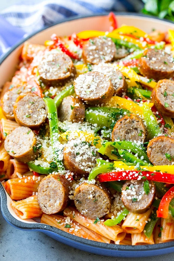Sausage and Pepper Pasta Recipe | Italian Sausage Recipe | Sausage and Peppers | Easy Pasta #pasta #sausage #peppers #dinner #jonep Sausage and pepper pasta with sliced Italian sausage, red and yellow bell peppers and grated parmesan cheese.