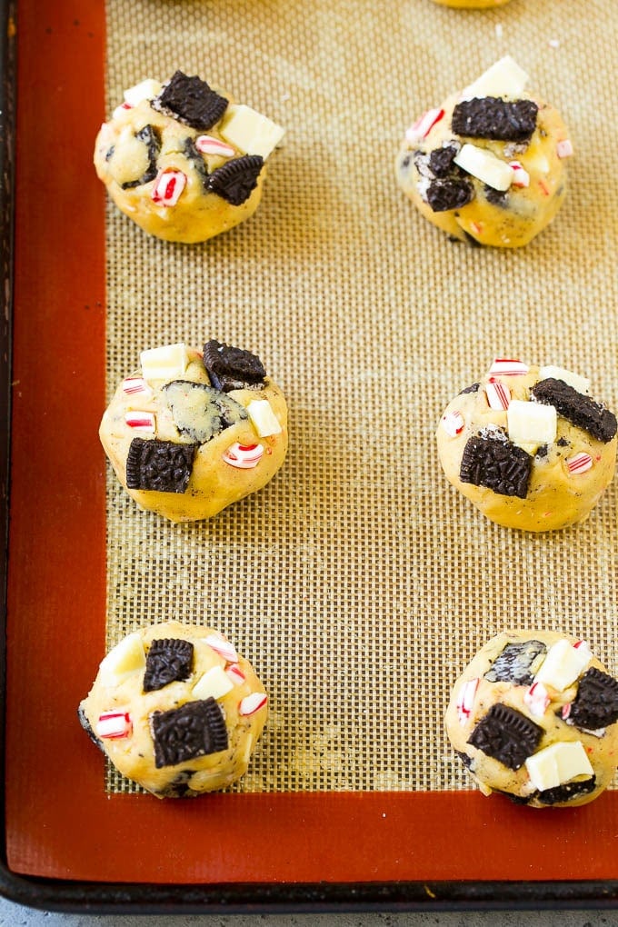 Oreo Peppermint Cookies Recipe | Candy Cane Cookies | Oreo Cookies #oreo #peppermint #cookies #baking #Christmas #sweets #jonep A sheet pan of unbaked cookies.