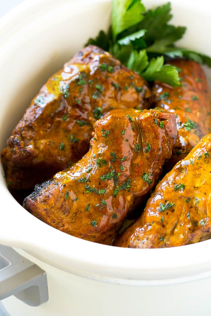 Slow Cooker Pork Tenderloin Recipe | Crock Pot Pork Tenderloin | Easy Pork Tenderloin #slowcooker #crockpot #pork #dinner #jonep Slow cooker pork tenderloins coated with sauce, inside a crock pot.