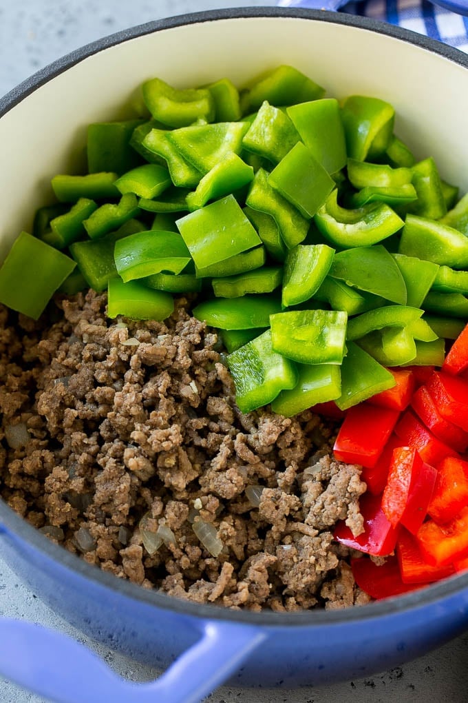 Stuffed Pepper Soup Recipe | Beef and Rice Soup | Stuffed Peppers #peppers #soup #beef #rice #dinner #jonep Cooked ground beef and bell peppers in a soup pot.
