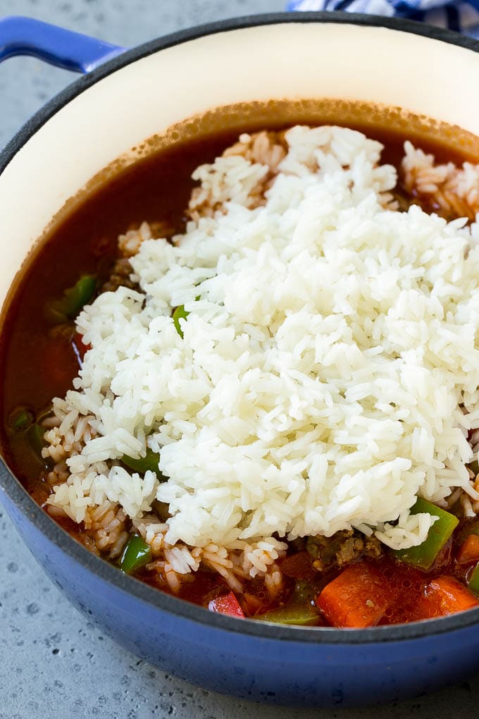 Stuffed Pepper Soup Recipe | Beef and Rice Soup | Stuffed Peppers #peppers #soup #beef #rice #dinner #jonep Cooked rice being on top of soup.