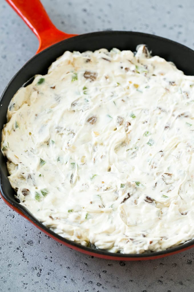 Philly Cheesesteak Dip Recipe | Cheesy Dip | Baked Cheese Dip #steak #dip #appetizer #cheese #jonep Steak, peppers and onions in a skillet, mixed with cream cheese.