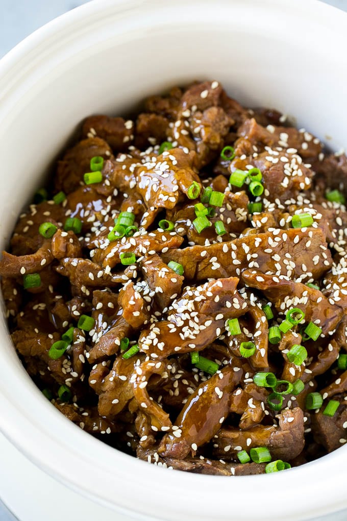 Slow Cooker Korean Beef Recipe | Korean Beef | Flank Steak Recipe #dinner #beef #slowcooker #crockpot #asian #jonep Slow cooker Korean beef with flank steak slices in a sweet and savory sauce, all inside a crock pot.