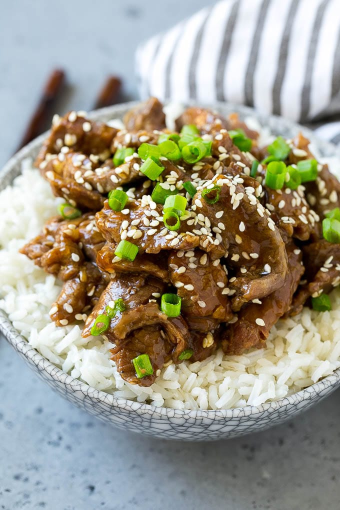 Slow Cooker Korean Beef Recipe | Korean Beef | Flank Steak Recipe #dinner #beef #slowcooker #crockpot #asian #jonep Slow cooker Korean beef served over steamed rice.