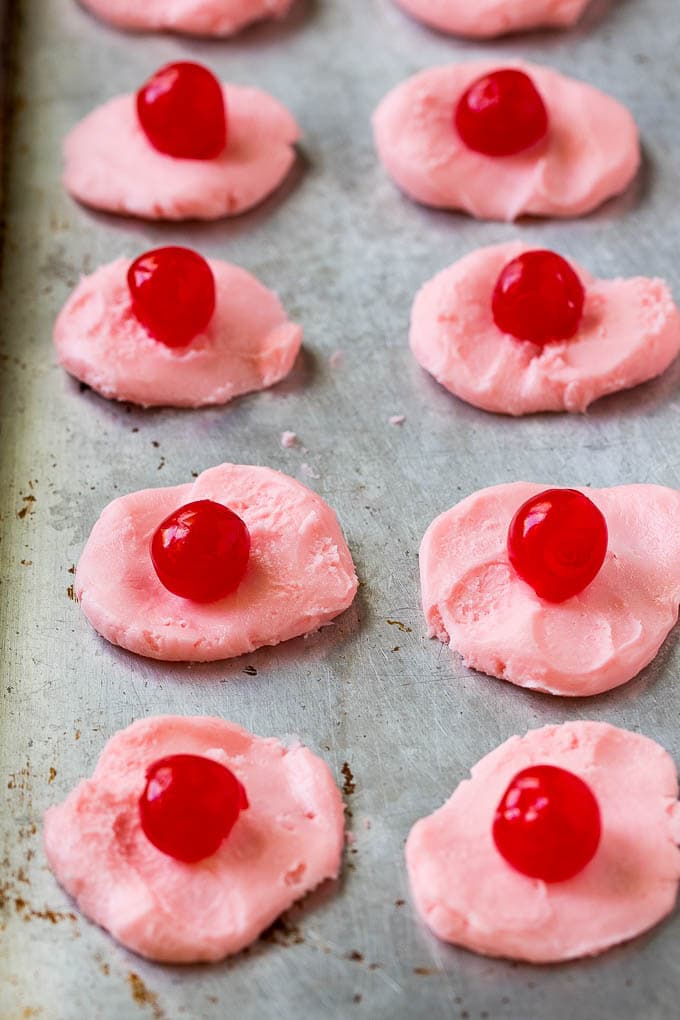 Chocolate Covered Cherries Recipe | Cherry Cordials | Cherry Candy #chocolate #candy #dessert #cherry #sweets #jonep Discs of cherry filling with a maraschino cherry on top.